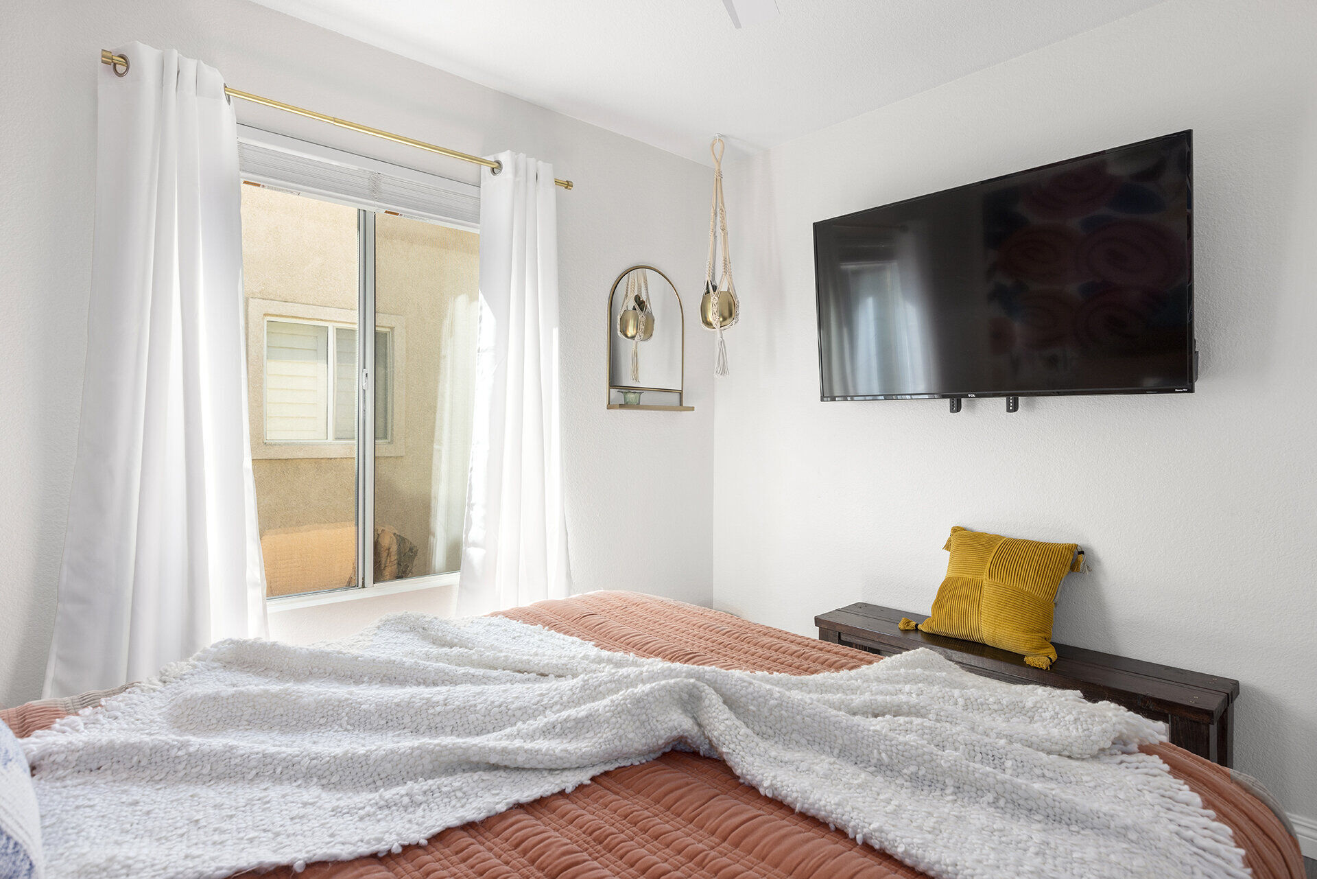 Second bedroom with twin beds and colorful bedding
